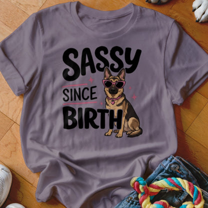 German Shepherd dog wearing sunglasses with text "SASSY SINCE BIRTH".