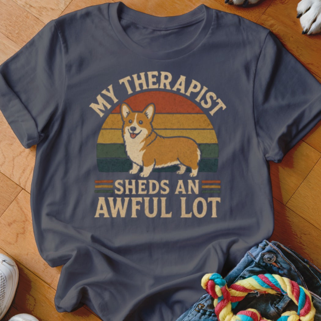 Dark blue t-shirt with a corgi and text "MY THERAPIST SHEDS AN AWFUL LOT".