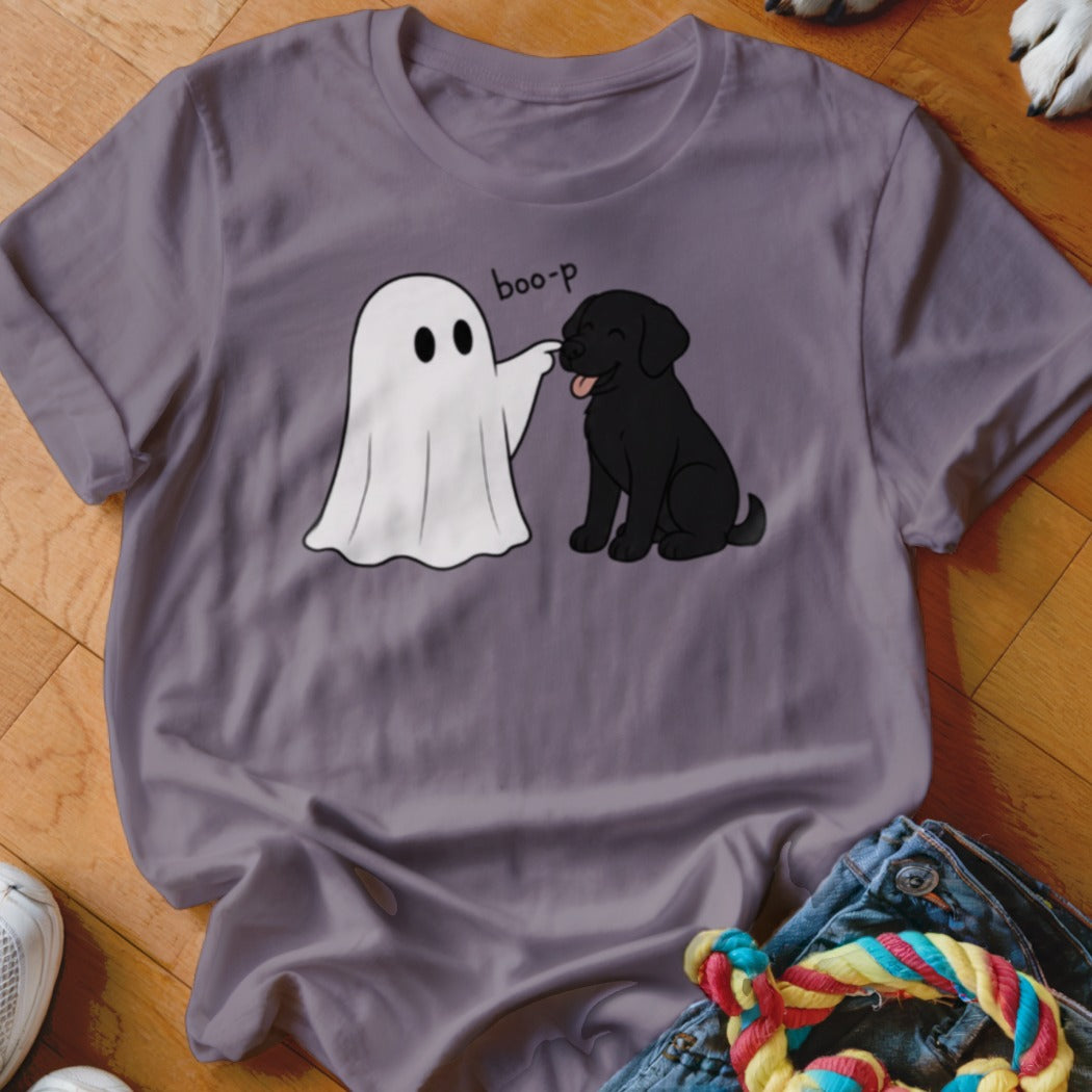 Ghost costume poking a black puppy's nose with "boo-p" text.
