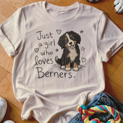 White t-shirt with a sketch of a Bernese Mountain Dog and text "Just a girl who loves Berners."