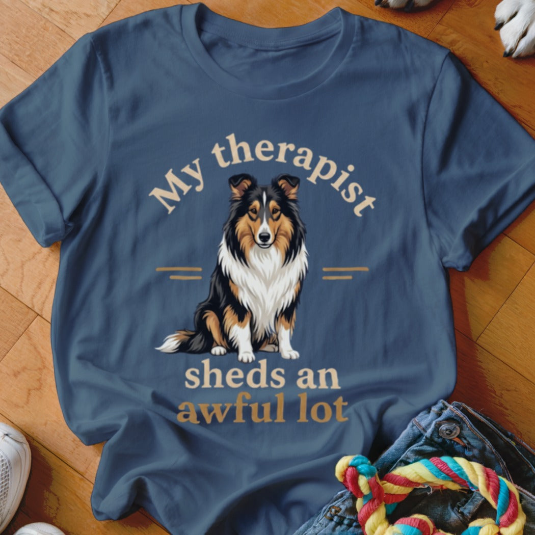 Blue t-shirt with "My therapist sheds an awful lot" and a Sheltie dog graphic.