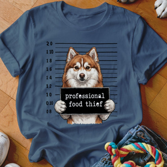 Husky with a "professional food thief" sign on a mugshot background.