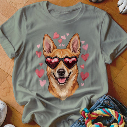 Gray t-shirt featuring an illustration of a smiling dog wearing heart-shaped sunglasses surrounded by pink hearts.