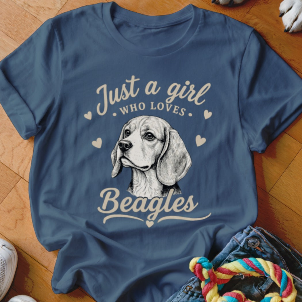 A blue t-shirt printed with a beagle graphic and the text Just a girl who loves Beagles.