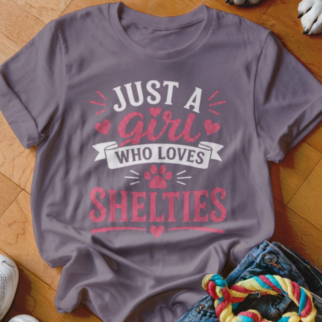 Grey t-shirt with "Just A Girl Who Loves Shelties" text and paw print.