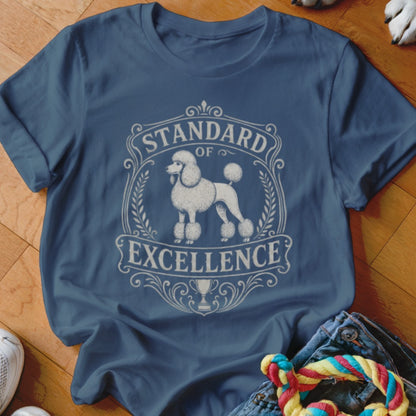 Blue t-shirt with white poodle graphic and text "Standard of Excellence."
