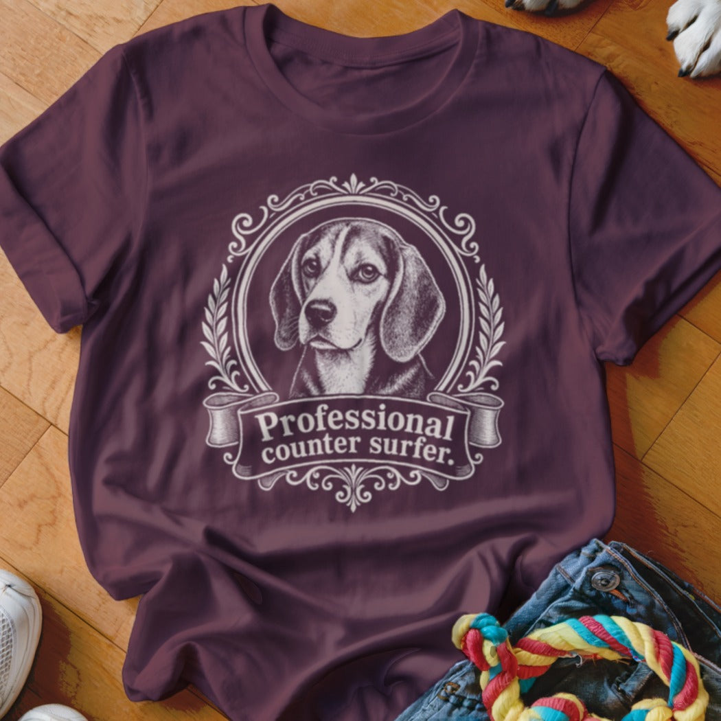 Maroon t-shirt with Beagle graphic and text "Professional counter surfer."
