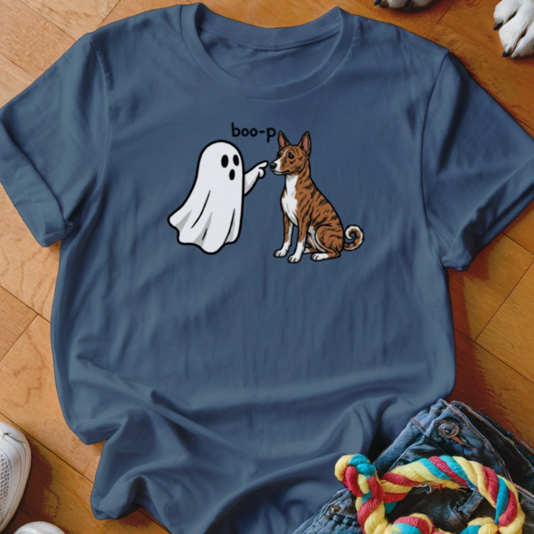 Cartoon ghost "boop-p" a brown and white striped dog on a navy blue t-shirt.