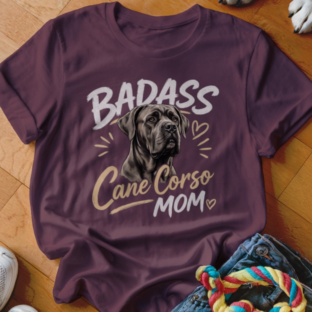 Maroon t-shirt featuring a Cane Corso graphic and the text Badass Cane Corso Mom.