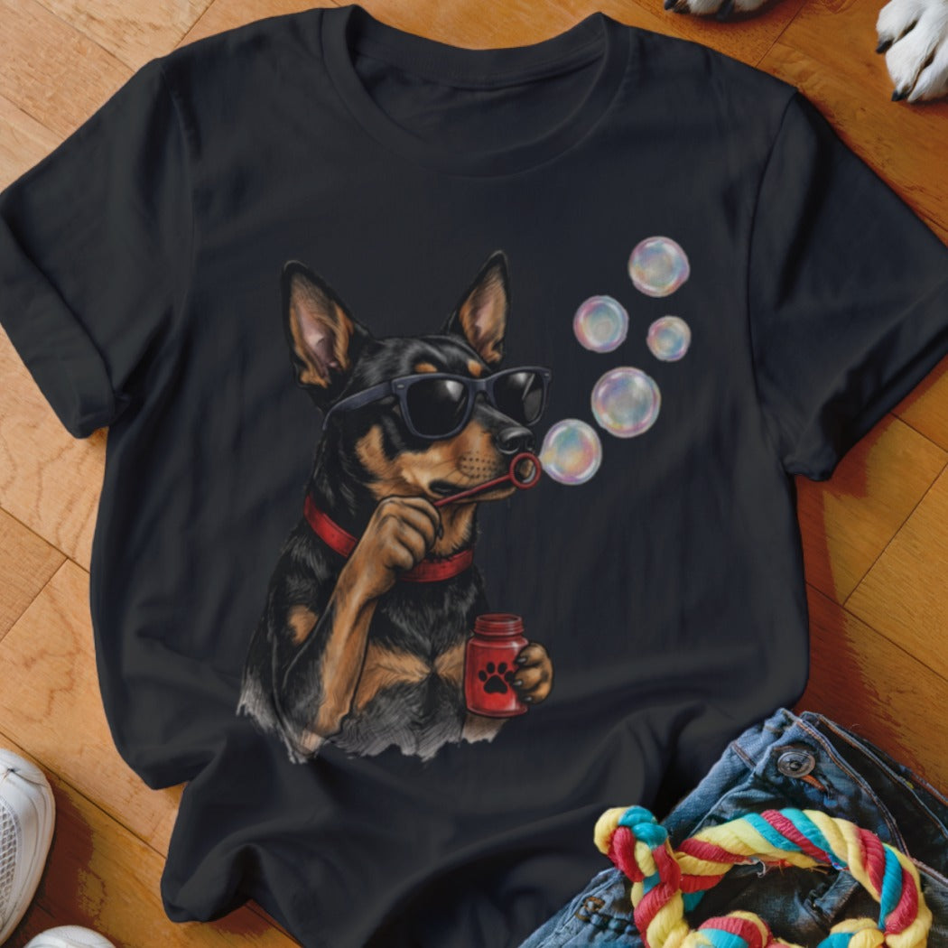 A black t-shirt features a graphic of a dog wearing sunglasses and blowing soap bubbles.