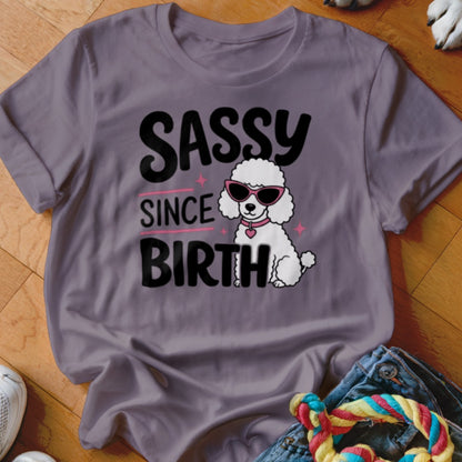 Purple t-shirt with "SASSY SINCE BIRTH" text and a white poodle wearing sunglasses.