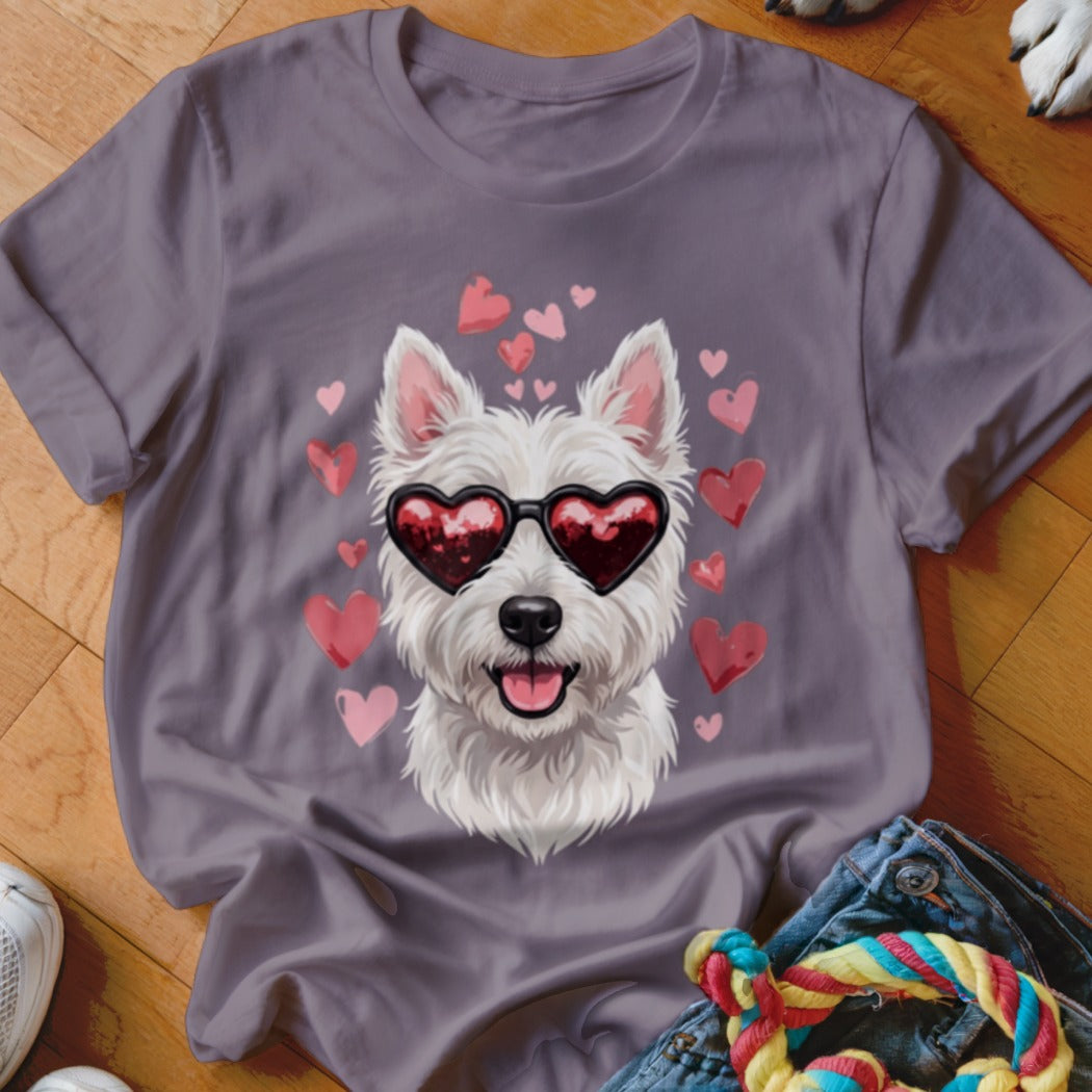 A grey t-shirt featuring a graphic of a white West Highland Terrier wearing heart-shaped sunglasses surrounded by floating pink hearts.