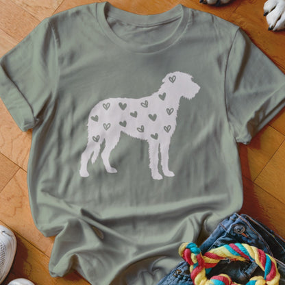 Grey t-shirt with white silhouette of a dog covered in small hearts.