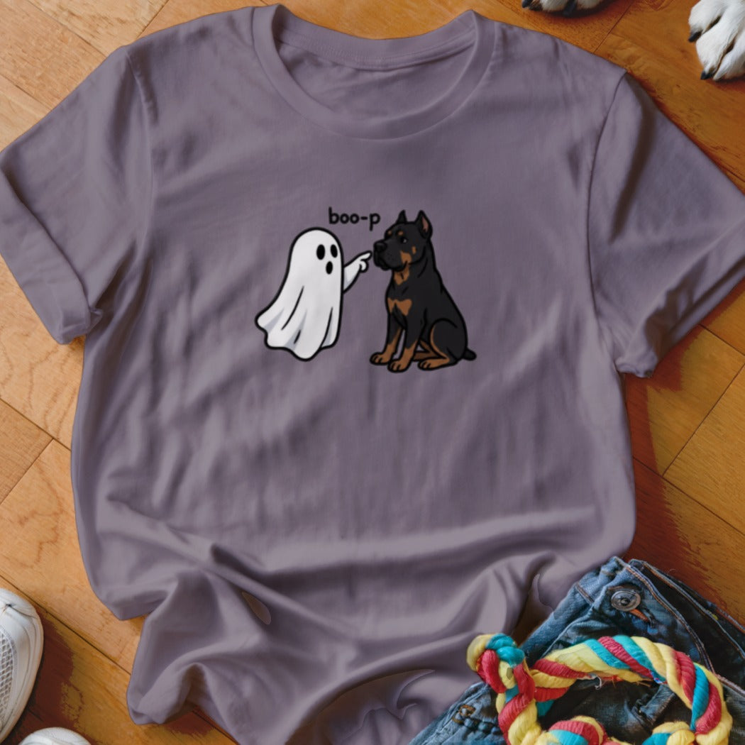 Ghost pointing at Rottweiler dog with text "boo-p" on t-shirt.