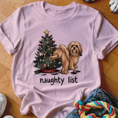 Pink t-shirt with a dog and Christmas tree graphic, saying "naughty list".