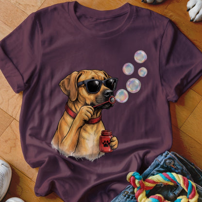 Maroon crewneck t-shirt featuring an illustration of a brown dog wearing sunglasses and blowing bubbles.