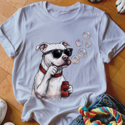 A white crewneck t-shirt featuring an illustration of a white dog wearing sunglasses and blowing bubbles.