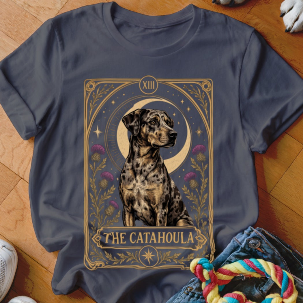 Charcoal gray t-shirt featuring a tarot card graphic of a Catahoula leopard dog with purple flowers and a crescent moon.