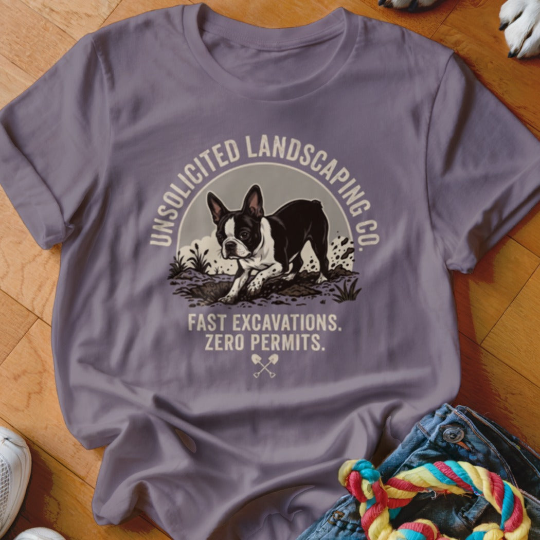 T-shirt graphic with Boston Terrier digging, text "Unsolicited Landscaping Co. Fast Excavations. Zero Permits."