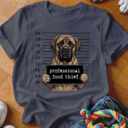 Mastiff dog in mugshot with "professional food thief" sign and height markers.