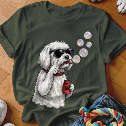 Dark green t-shirt featuring an illustration of a white dog wearing sunglasses and blowing bubbles.