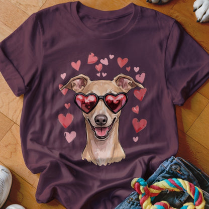 Maroon t-shirt featuring a graphic of a smiling dog wearing heart-shaped sunglasses surrounded by floating pink hearts.