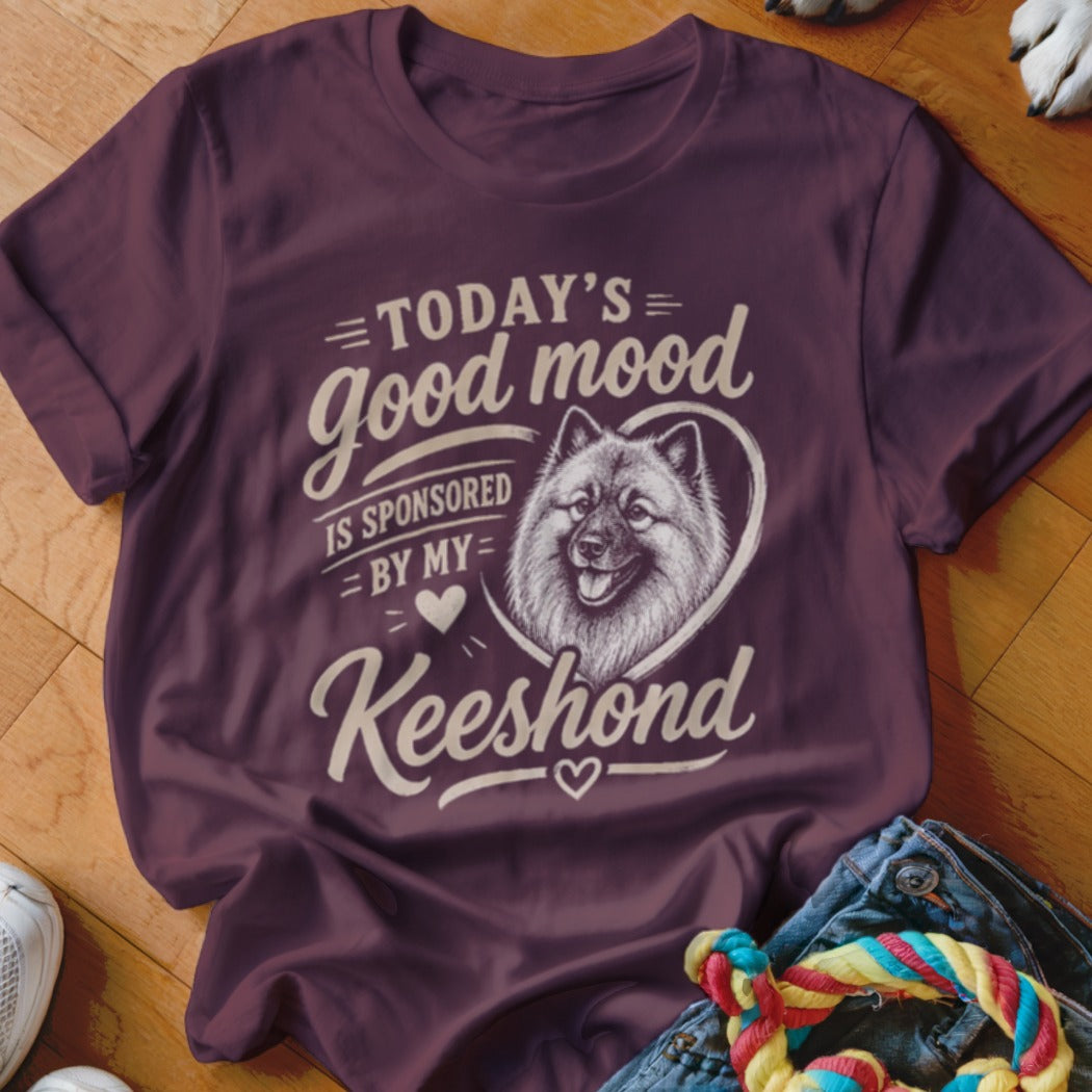 Maroon t-shirt with "Today's good mood is sponsored by my Keeshond" text and dog illustration.