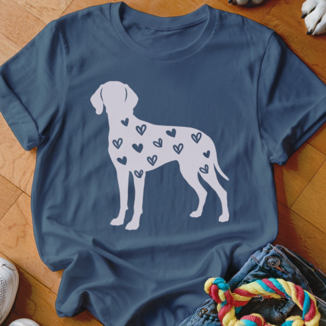 Blue t-shirt with white dog silhouette covered in small dark blue hearts.