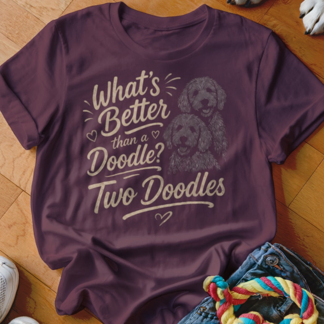 Maroon t-shirt with "What's Better than a Doodle? Two Doodles" and two doodle dogs.