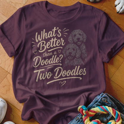 Maroon t-shirt with "What's Better than a Doodle? Two Doodles" and two doodle dogs.