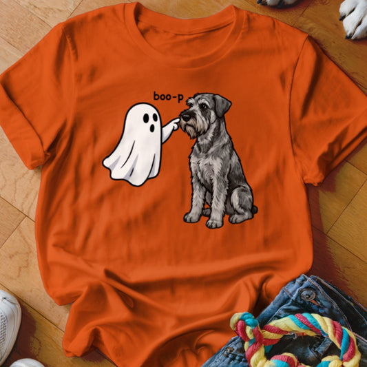 Orange t-shirt with cartoon ghost boo-ping a schnauzer dog.