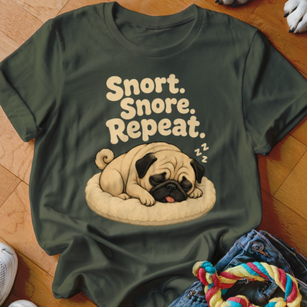 Green t-shirt with illustration of sleeping pug and text "Snort. Snore. Repeat."