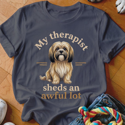 Dark grey t-shirt with a fluffy dog and text "My therapist sheds an awful lot".