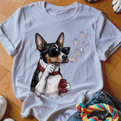 White t-shirt featuring an illustration of a dog wearing sunglasses and blowing soap bubbles.