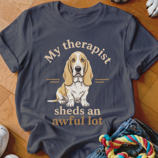 Dark grey t-shirt with Basset Hound graphic and text: "My therapist sheds an awful lot".