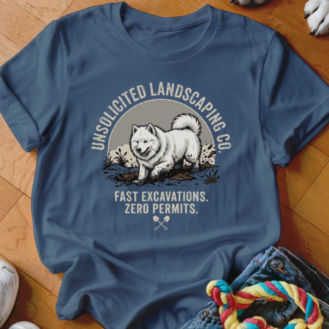 Blue t-shirt with graphic of dog digging, "Unsolicited Landscaping Co." and "Fast Excavations. Zero Permits."