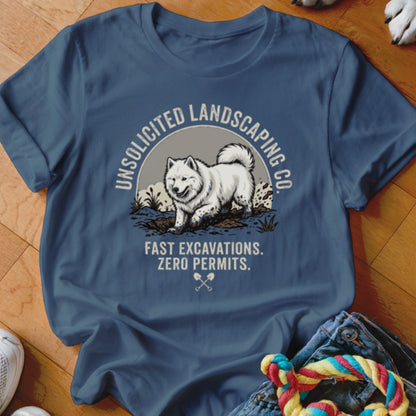 Blue t-shirt with graphic of dog digging, "Unsolicited Landscaping Co." and "Fast Excavations. Zero Permits."