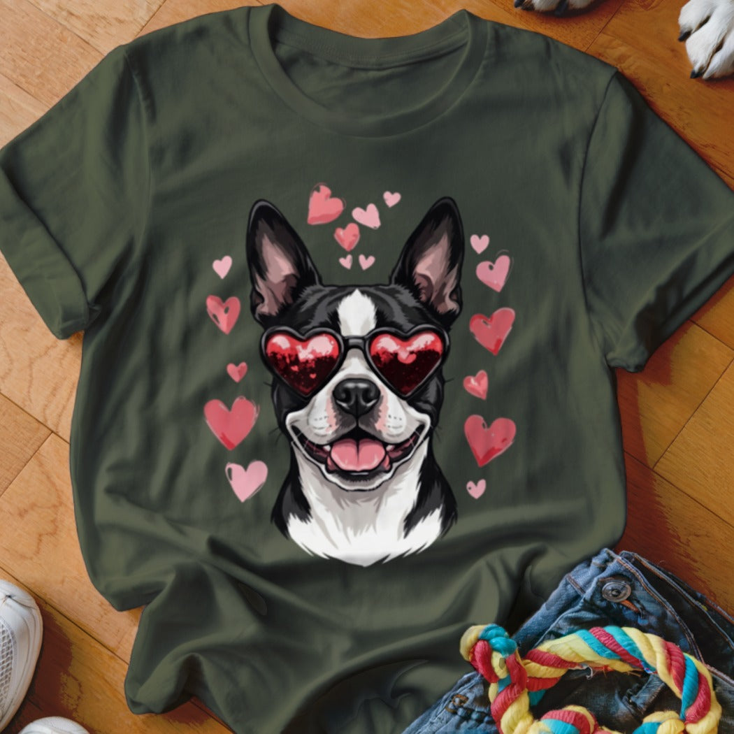 Dark green crewneck t-shirt featuring a graphic of a Boston Terrier wearing heart-shaped sunglasses surrounded by pink hearts.