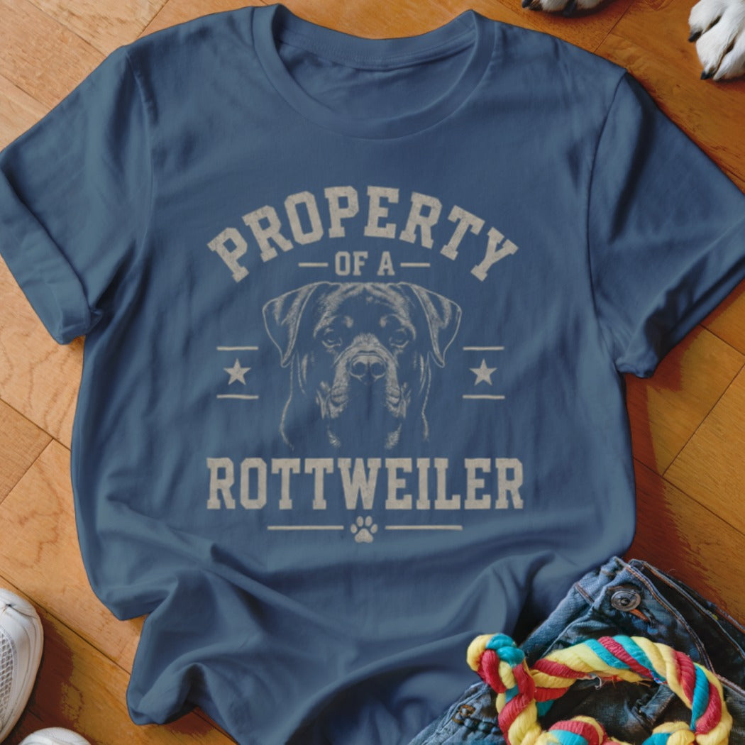 Blue t-shirt with "PROPERTY OF A ROTTEWEILER" and Rottweiler graphic.