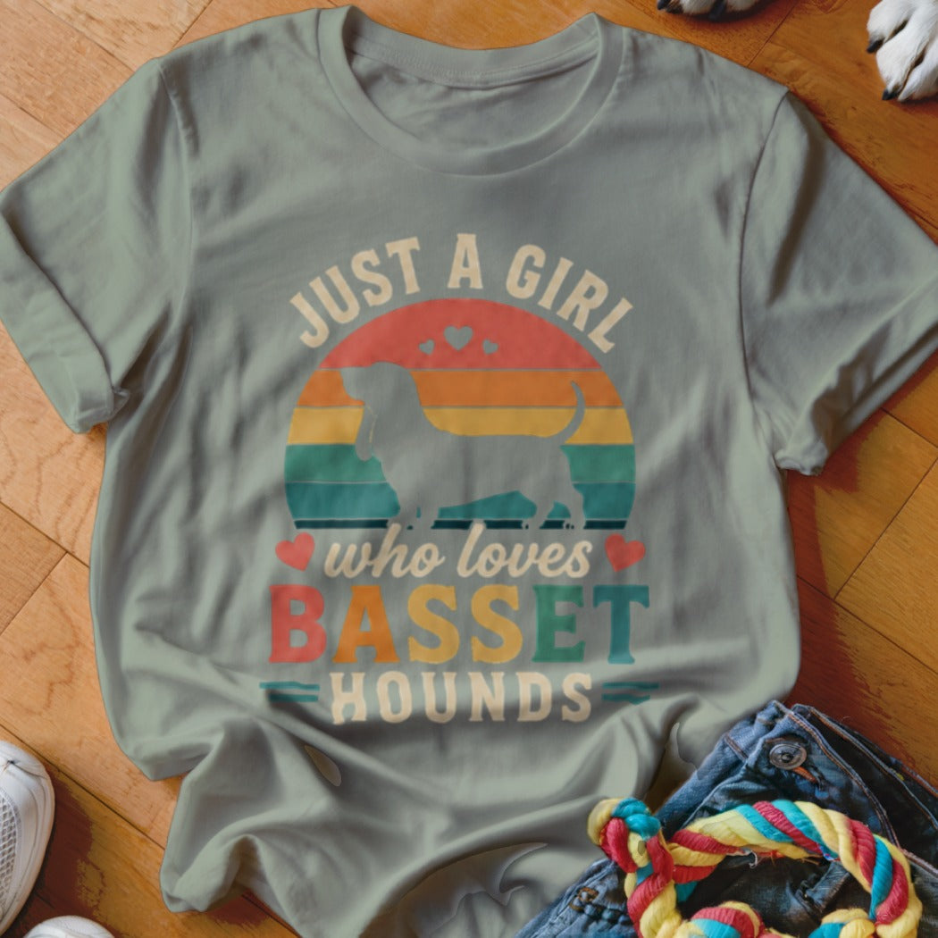 Light blue t-shirt with "Just a girl who loves Basset Hounds" text and silhouette.