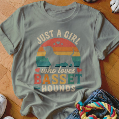 Light blue t-shirt with "Just a girl who loves Basset Hounds" text and silhouette.