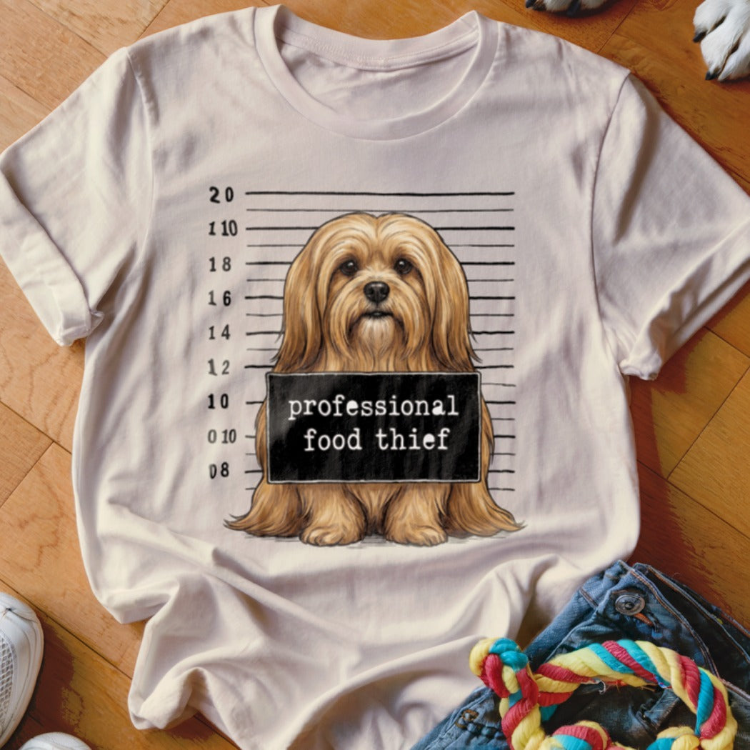Light tan t-shirt with a dog mugshot graphic and "professional food thief" text.