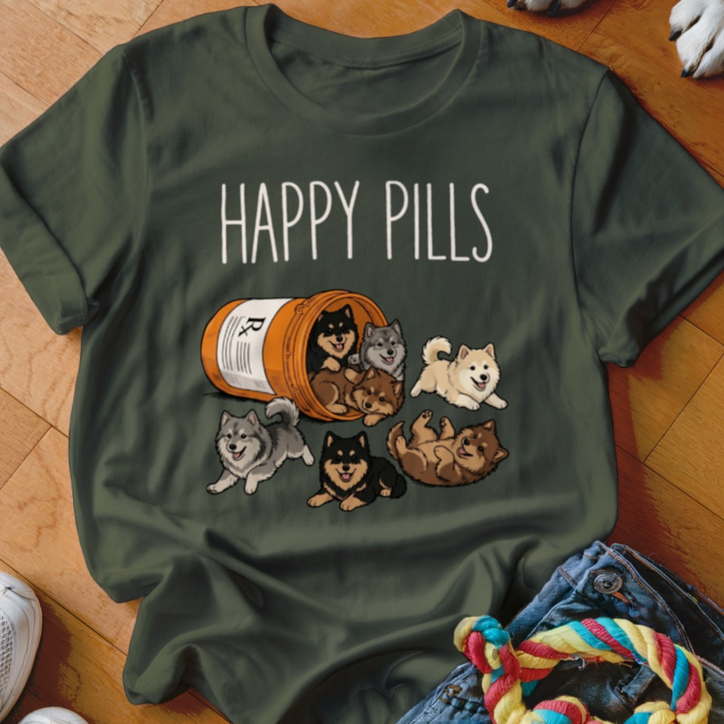 Green t-shirt with "HAPPY PILLS" text and cartoon puppies spilling from a pill bottle.