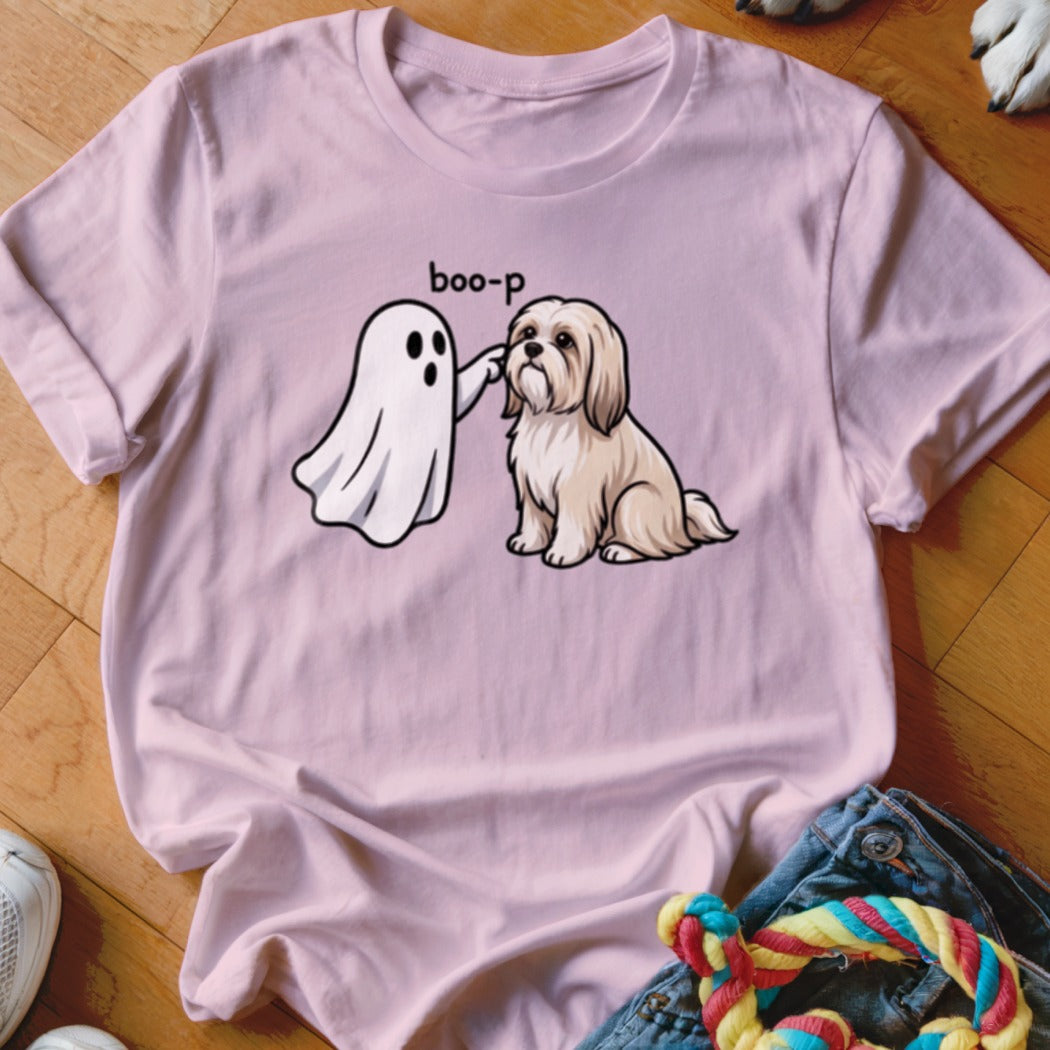Ghost poking dog's nose with "boo-p" text on pink t-shirt.
