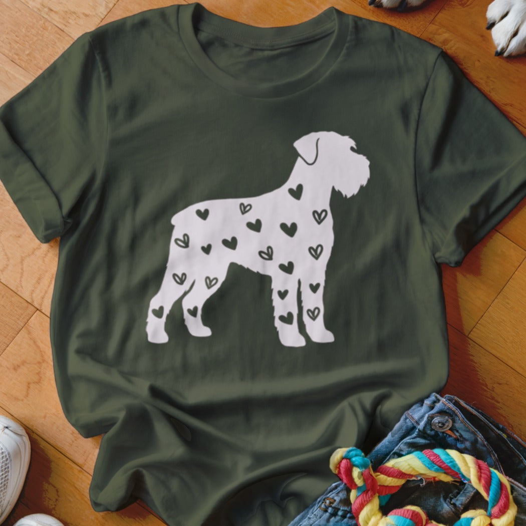 Schnauzer silhouette filled with black hearts on a green t-shirt.