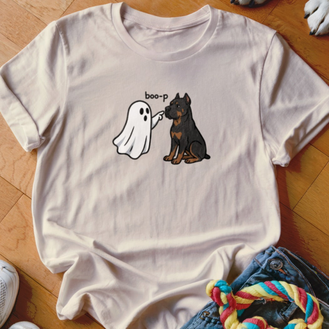Ghost with text "boo-p" booping a black and tan dog on shirt.