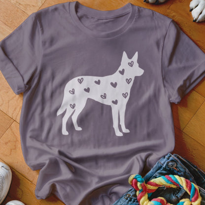 Purple t-shirt with white silhouette of a dog filled with small hearts.