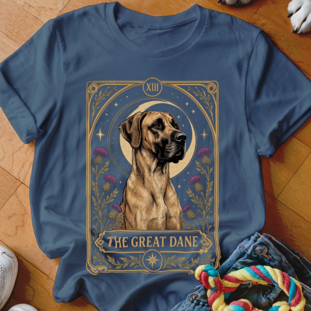 Blue t-shirt featuring a tarot card graphic of a Great Dane surrounded by thistle and a crescent moon.
