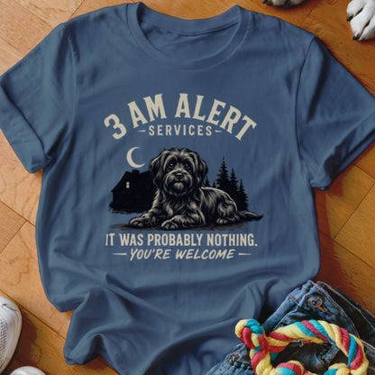 Blue t-shirt with a black dog, house, and trees graphic. Text reads "3 AM ALERT SERVICES - IT WAS PROBABLY NOTHING - YOU'RE WELCOME".