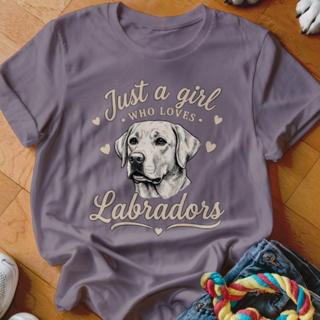A purple t-shirt featuring a Labrador graphic and text that reads "Just a girl who loves Labradors."